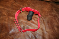 Suck on This - Padded Panel Silicone Penis Mouth Gag - Red