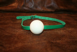 Basic White Ball Gag w/ Green Leather Strap